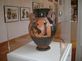 Juxtaposition of Maguire's lithographs and a Greek vase