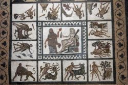 Mosaic with Hercules' twelve Labours in panels surrounding the central panel of Hercules and Omphale